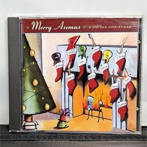 Merry Axemas A Guitar Christmas CD Jeff Beck Steve Vai Joe Perry Joe Satriani